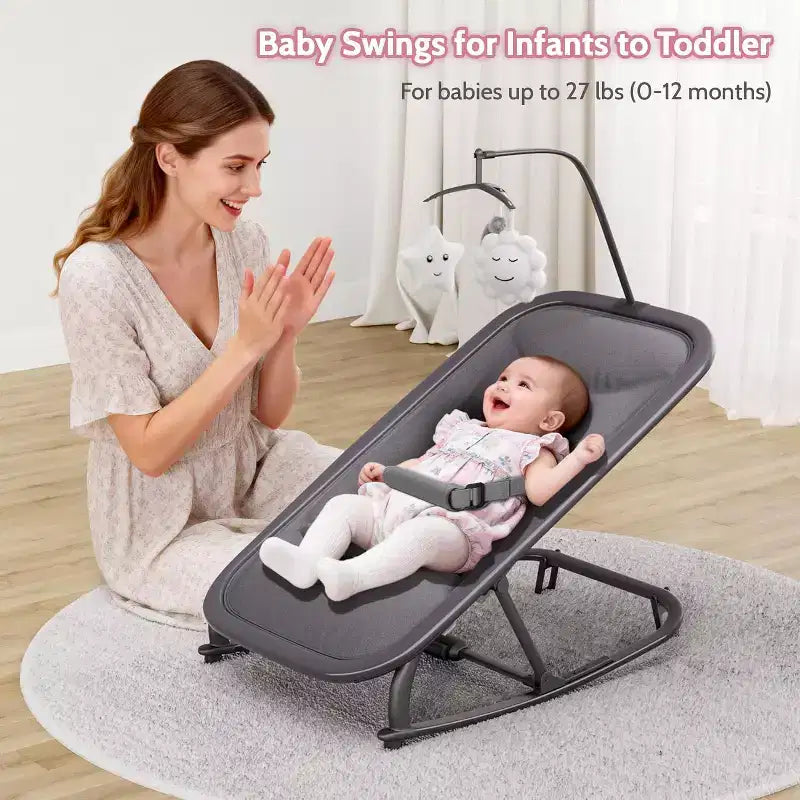 Baby Rocking Bassinet Infant Swing with Safety Harness & Hanging Toys, Black Soft Padded Newborn Lounger for Babies & Toddlers